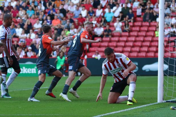 Oli celebrates scoring at Bramall Lane