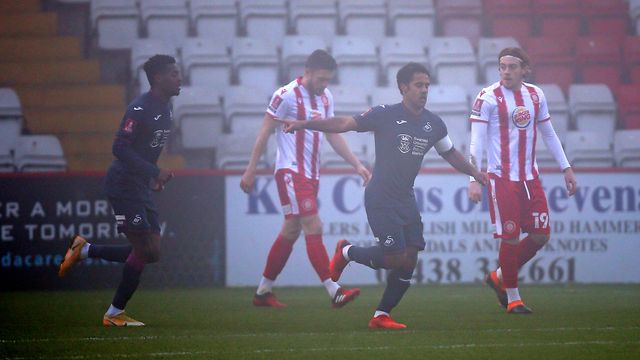Wayne Routledge opens the scoring at Stevenage