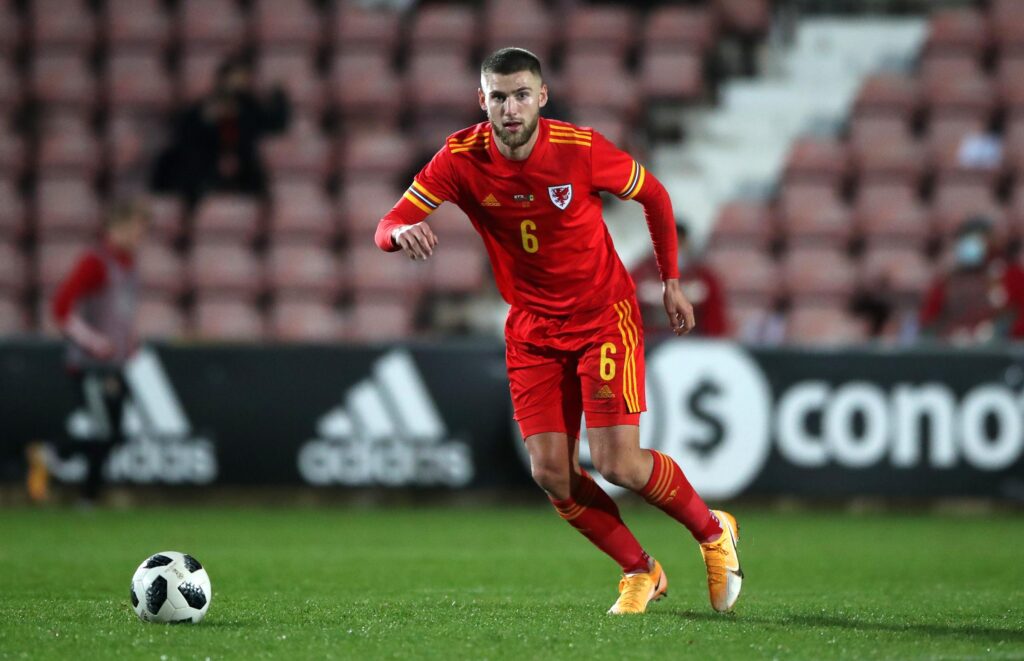 Brandon Cooper playing for Wales