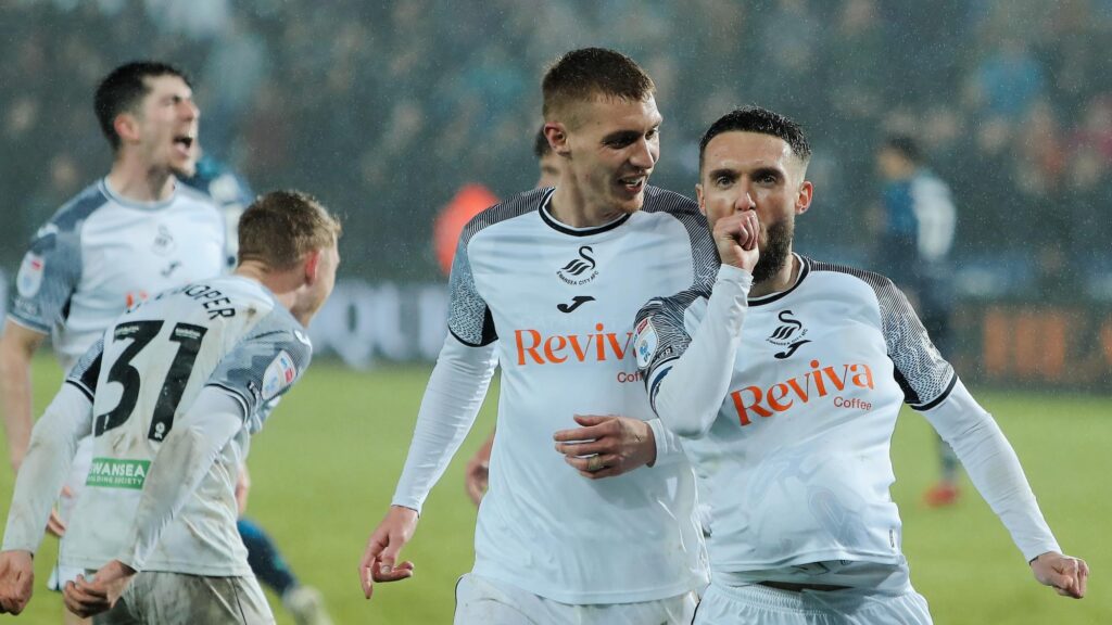 Matt Grimes celebrates scoring against Stoke