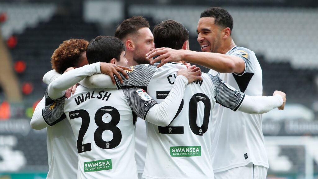 Swansea players celebrate against Rotherham