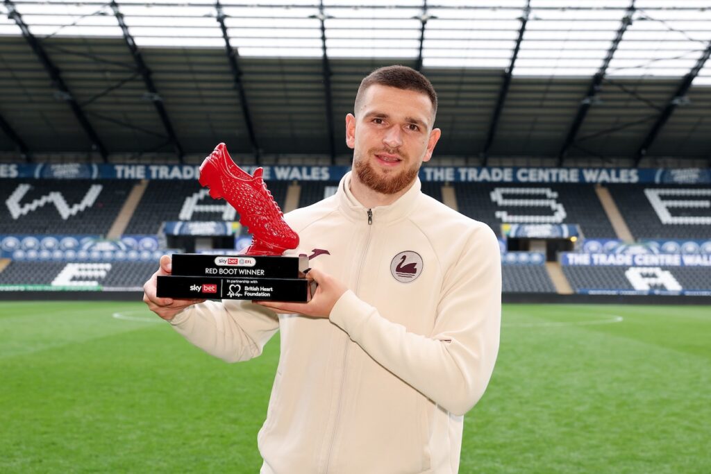 Zan Vipotnik of Swansea City is presented with the Sky Bet EFL Red Boot award for the season 2025/26, at Swansea.com Stadium. This new award is given to the top scorer across all three EFL divisions in support of the Every Minute Matters campaign. - Mandatory by-line: Ashley Crowden/JMP - 02/05/2026 - Swansea.com Stadium - Swansea, Wales - Sky Bet EFL Every Minute Matters campaign